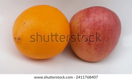 this is a picture of an apple and lemon