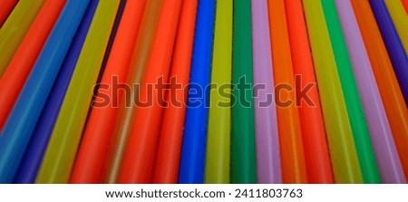 Multicolored plastic drinking sticks, with them you can create abstract photographs.