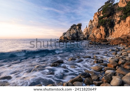 Coastline sunrise on the amazing rocky beach