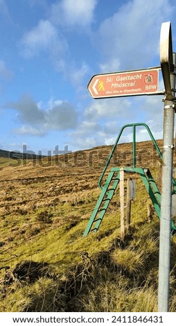 Irish hiking trail sign west Cork  Royalty-Free Stock Photo #2411846431