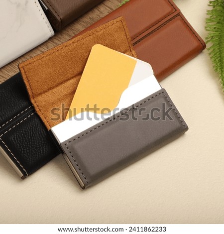 Colored leather business card holder, Genuine leather business card holder, concept shot, top view, different color, clamshell and stitched card holder
