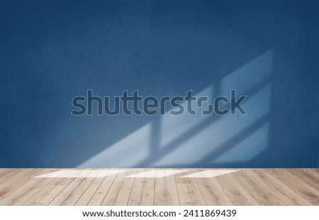 Blue wall empty room with wooden floor Royalty-Free Stock Photo #2411869439