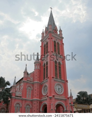 Pink church, Tan Dinh catholic Church, Ho Chi Minh city, The words on doorplate [Tan Dinh catholic Church] Royalty-Free Stock Photo #2411875671