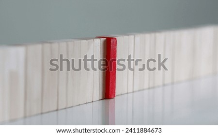 One red winner lottery wood block row lead rare disease multilevel personofication authority back search secret sample special spy closeup Royalty-Free Stock Photo #2411884673