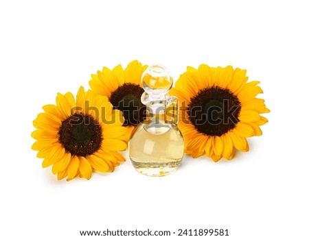 Decanter of sunflower oil on white background