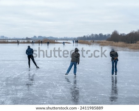 High quality a photo of people ice skating on a frozen lake in winter near Sneek, Friesland, the Netherlands