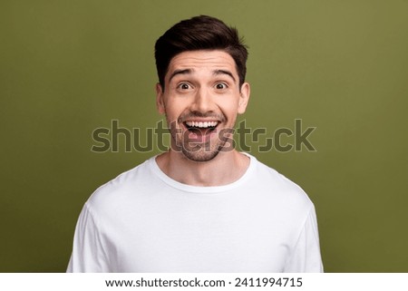 Photo of impressed cheerful person open mouth toothy smile cant believe isolated on khaki color background Royalty-Free Stock Photo #2411994715
