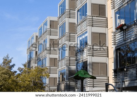 Facade of a modern residential building. Real estate investment. Expensive housing. High quality photo
