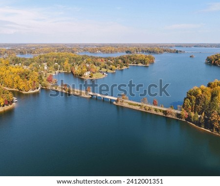 Autumn at Lake Anna Virginia's private side.  Colorful landscape surrounded by blue green lake water