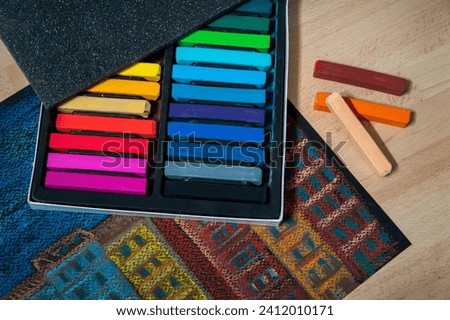 Set of soft pastel colored chalk as background, close-up. Material for drawing
