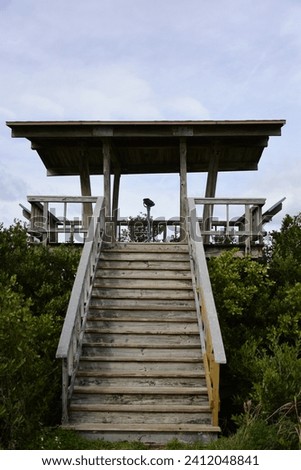 A Landscape Photo of an observation tower at the Black Point Wildlife Drive section Of Merritt Island National Wildlife Refuge I created on January 3, 2024.