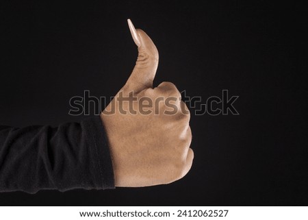 female hands with big nails using fingers to make various signs