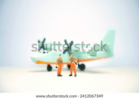 Mini toy of action figure at table with blurred background. Toy photography concept.