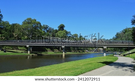 A foot bridge over the Parramatta River in western Sydney Royalty-Free Stock Photo #2412072911
