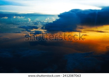 Fantasy sci-fi cloudy sky background. Shot from above the clouds