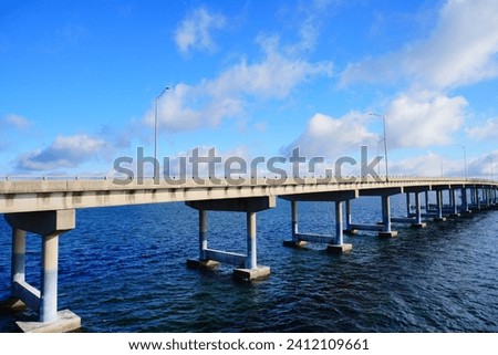 A highway bridge cross Tampa Bay	