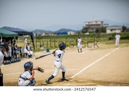 It is a picture of young students playing baseball.