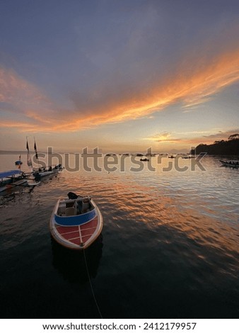Fisher man’s boat in East Pangandaran beach on sunrise Portrait Ver.