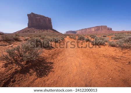hiking the wildcat trail in monument valley in arizona, usa