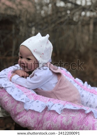 Dolls like children, beautiful autumn photos of a cute baby doll Royalty-Free Stock Photo #2412200091