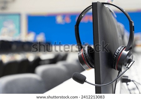 Headset is a symbol of communication and collaboration. It allows the agent to connect with the customer and provide them with the help they need. The headset is also a symbol of professionalism.
