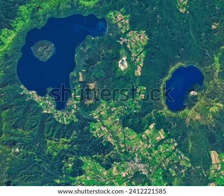 Parasitic Cones in Hokkaido. These nested volcanic features grew as small, secondary vents along the flanks of larger volcanoes. Elements of this image furnished by NASA.