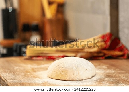 Sourdough bread. Homemade bread dough left to rise on the wood counter top inside a kitchen. Home bread making photo Bread baking.