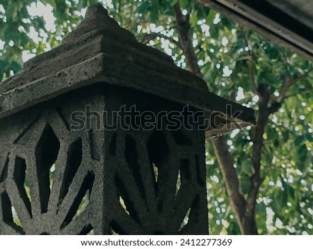 Close up photo of a house lamp post. Picture of gothic lantern