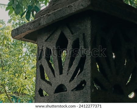 Close up photo of a house lamp post. Picture of gothic lantern