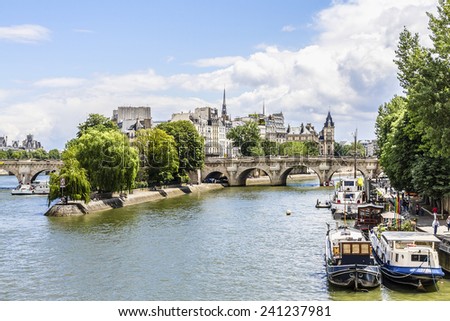 View of Seine River and famous Cite Island. Paris, France, Europe. Royalty-Free Stock Photo #241237981
