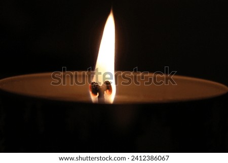 Burning candle flame close up, macro
