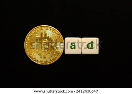 Word Bad made up of cubes. The first letter symbolized by bitcoin coin. Weak BTC concept, bitcoin price falls, negative BTC price outlook.