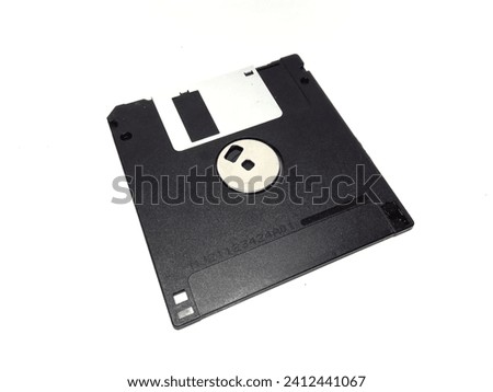 Magelang 14 January 2024-A floppy disk with an isolated white background, used as a place to store data when the technology is not yet sophisticated