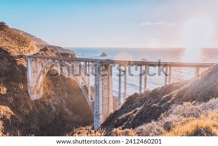 Bixby Bridge, also known as Bixby Creek Bridge, on the Big Sur coast of California, is one of the most photographed bridges in California due to its aesthetic design. Bixby Creek Bridge, Big Sur, CA Royalty-Free Stock Photo #2412460201