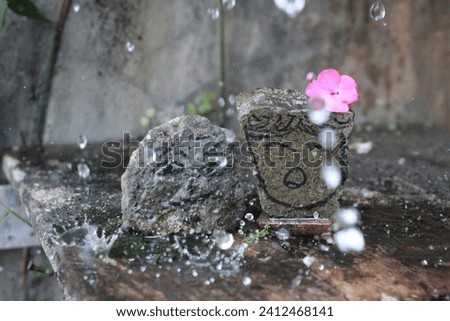 still life photography stone with rain effect