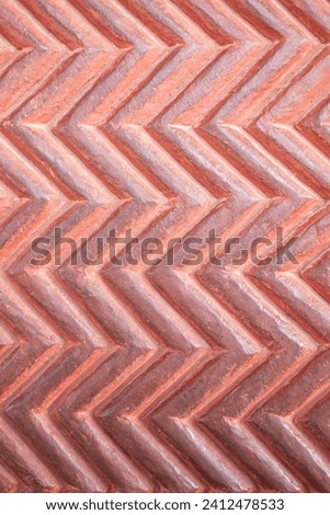 Red burnt orange Chevron pattern background. Classic abstract chevron pattern background, texture. Chevron background arrow pattern. Geometric pattern red Vintage rustic stone symmetrical background. 