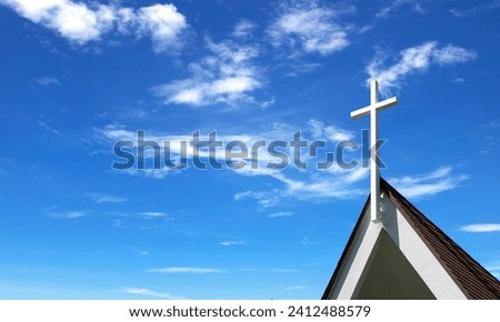 picture of a roof of a church with a background of sky