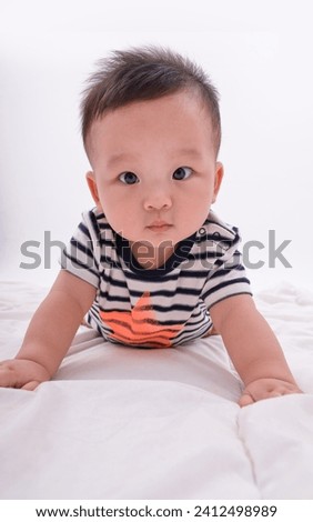 Cute baby lying on bed. Family, new life
