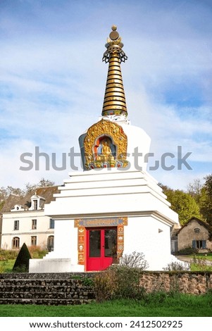 A vertical shot of the Great Stupa of Dharmakaya Royalty-Free Stock Photo #2412502925
