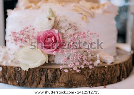 details of wedding cake with flower decoration