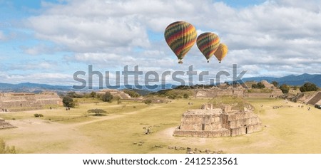 Hot air balloon flying over Ancient ruins on plateau Monte Alban in Mexico