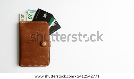 dock holder with euro and bank cards on a white background.