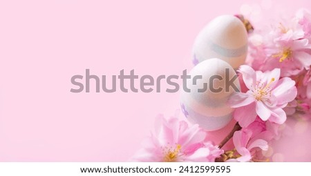 Easter eggs and pink flowers close up on a pink background with copy space. . Happy and joyful Easter. Church Christian holidays, Christianity, Easter background