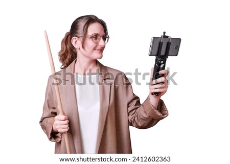 Happy woman teacher with phone for online lesson on studio isolated on a white background, copy space