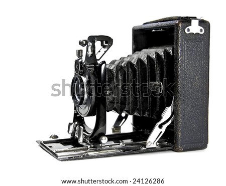 Vintage photo camera isolated on white background