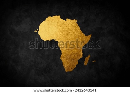Africa continent shaped from golden glitter on a black background. Royalty-Free Stock Photo #2412643141