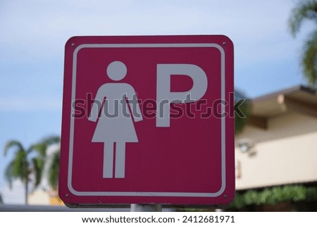 Sign Parking car for pregnant lady, to signify a parking area where women who are pregnant can park near a toilet. 