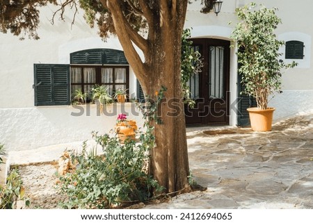 Villa in the Balearic Islands. Residence in Pollença. House in Spain. Hispanic house facade Royalty-Free Stock Photo #2412694065