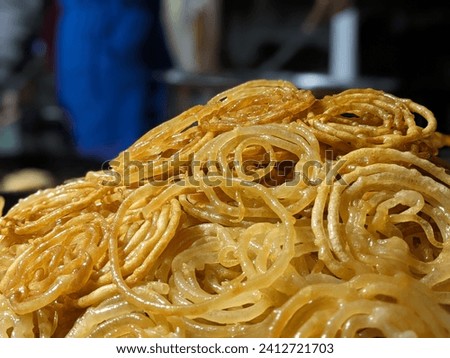 Portrait Image of jalebi   (Jalebi is  traditional Punjabi sweets 
made on all the auspicious occasions especially in Punjab, prepared mostly in winters. Royalty-Free Stock Photo #2412721703