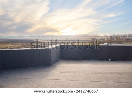 Construction of a new house. beautiful view of the sky and the picturesque village from the large balcony. spacious roof, patio seating area with a beautiful view.